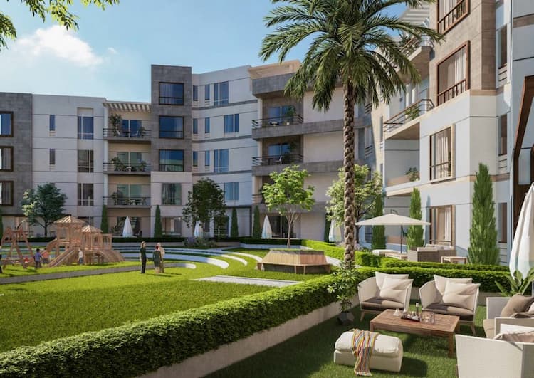 صورة لكمبوند المحور 6 أكتوبر والمساحات الخضراء الموجدوة فيه.