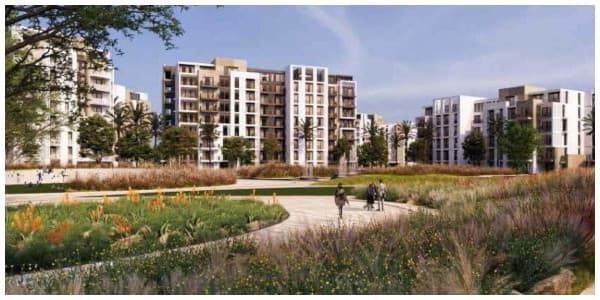 مباني سكنية بها شقق للبيع في كمبوند زيد ايست تطل على مساحات خضراء